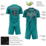 Teal Jersey Sublimation Fußballuniform Schwarz-Weiß Custom Teal Jersey Sublimation Fußballuniform Schwarz-Weiß Custom
