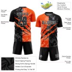 Fußball Sublimation Uniform Graffiti Schwarz-Orange Muster Jersey Scratch Custom Fußball Sublimation Uniform Graffiti Schwarz-Orange Muster Jersey Scratch Custom
